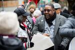 Rev. E.D. Mondainé, right, speaks with Sylvia Dollarson outside City Hall in Portland, Ore., Friday, Feb. 22, 2019.