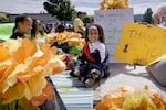 Grants Pass Remembrance volunteers taking part in the city’s annual Boatnik Parade in Grants Pass, Ore., May 25, 2024.