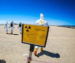 Members of the Nuclear Emergency Support Team training for a radiological contamination scenario. For fifty years, the secretive team has been the first line of defense against nuclear emergencies.