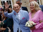 U.S. World War II veteran Harold Terens, 100, left, and Jeanne Swerlin, 96, arrive to celebrate their wedding at the town hall of Carentan-les-Marais, in Normandy, northwestern France, on Saturday.