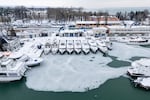 Ice builds up at a pier of Lake Balaton at Siofok, Hungary, Wednesday, Jan. 7, 2026.