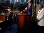 President Biden prepares to deliver the State of the Union address to a joint session of Congress at the Capitol on Feb. 7 as Vice President Kamala Harris, House Speaker Kevin McCarthy of Calif., and Clerk of the House of the Representatives Cheryl Johnson watch.