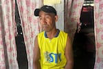 Fisherman Larry Hugo, 45, in his home on Thitu Island, which the Philippines calls Pag-asa.