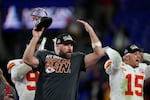 Kansas City Chiefs tight Travis Kelce, left, and quarterback Patrick Mahomes celebrate the AFC conference win on Sunday against the Baltimore Ravens.