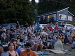 Crowds gather to see migrating Vaux's swifts roosting in the chimney at Chapman Elementary in Portland, Oregon.