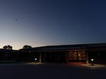 A plane flies over the Beacom/Reischl Transitional Care Unit and Oakwood Assisted Living facility in Sioux Falls on May 18. Senior care facilities are in short supply across much of rural America, especially in depopulating areas of the Great Plains, where a majority of facilities are concentrated in larger cities.