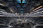 The floor and seating areas of Climate Pledge Arena are shown Wednesday, Oct. 20, 2021, during a media tour ahead of the NHL hockey Seattle Kraken's home opener Saturday against the Vancouver Canucks in Seattle. The historic angled roof of the former KeyArena was preserved, but everything else inside the arena, which will also host concerts and be the home of the WNBA Seattle Storm basketball team, is brand new. (AP Photo/Ted S. Warren)