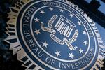 A seal reading "Department of Justice Federal Bureau of Investigation" is displayed on the J. Edgar Hoover FBI building in Washington, DC, o August 9, 2022..