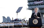 President George W. Bush speaks aboard the aircraft carrier USS Abraham Lincoln on May 1, 2003. He declared 'major combat operations' were over in Iraq, just weeks after the U.S. launched its war. However, the war dragged on for many more years as the U.S. battled insurgents.