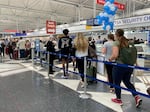 Travelers line up to get into the security checkpoint at Chicago's O'Hare airport last summer.