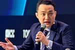 Cryptocurrency entrepreneur Justin Sun participates in a session during the Token 2049 crypto conference in Dubai on May 1, 2025. Sun is a top investor in Trump's meme coin and says he plans to attend an exclusive dinner with the president.