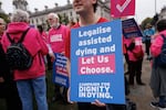 Campaigners in Parliament Square in favor of the proposed bill to legalize assisted dying, on Oct. 16 in London, England.