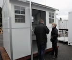 Speaker of the Oregon House, Tina Kotek, D-Portland, is shown one of the new homes that will be made available to houseless Portlanders Friday.