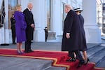 President Joe Biden, center left, and first lady Jill Biden, left, greet President-elect Donald Trump, center right, and Melania Trump, right, upon arriving at the White House, Monday, Jan. 20, 2025, in Washington.