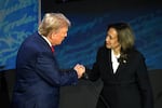 Vice President Harris, the Democratic presidential nominee, shakes hands with former President Donald Trump, the Republican nominee, during the presidential debate in September.