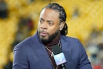 FILE - Host Richard Sherman appears on Amazon Prime's "Thursday Night Football" before an NFL football game between the Pittsburgh Steelers and the New England Patriots, Dec. 7, 2023, in Pittsburgh. Authorities in Washington state said the former NFL player was arrested early Saturday, Feb. 24, 2024, on suspicion of driving under the influence. No other details about the arrest were immediately available.