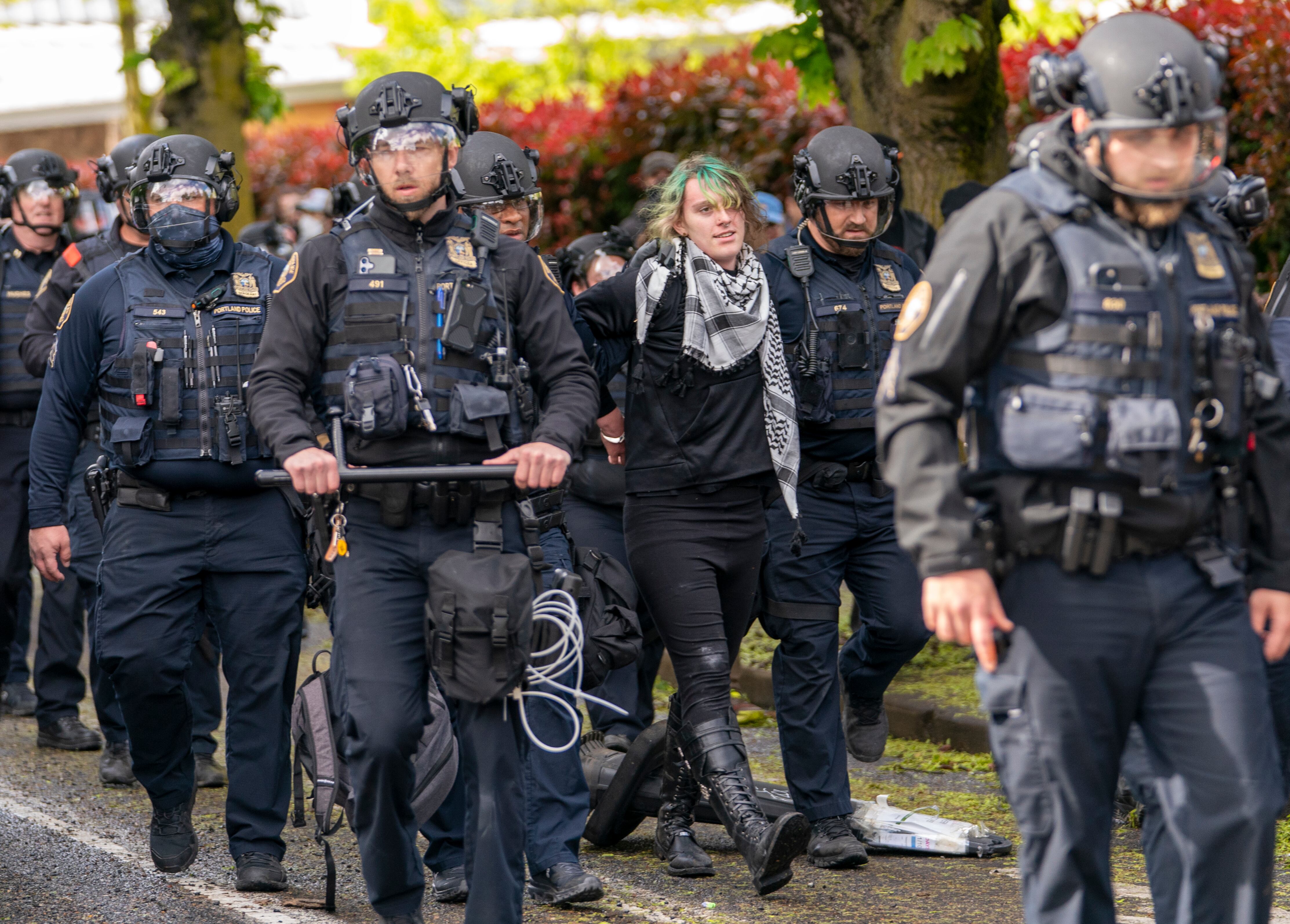 Law enforcement teams clear protesters from Portland State University’s Branford Price Millar Library, May 2, 2024. Demonstrators protesting the war in Gaza have occupied the library since Monday evening.