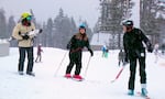 FILE - Skiers are having a fun time on top of Mt. Hood Meadows on March 12, 2022. But ski areas across the Pacific Northwest have to delay their opening this year due to a warmer and wetter winter caused by the El Nino climate phenomenon.