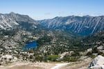 FILE — Alpine lakes and glacier-carved valleys as seen from the top of Eagle Cap in Oregon’s Wallowa Mountains, which are part of the region known as the Blue Mountains. Aug.10, 2023