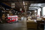 Furniture is displayed at America The Beautiful Dreamer in Vancouver, Wash., Thursday, June 27, 2019. Oregon shoppers will no longer receive exemptions from Washington's sales tax, which has some business owners worried about losing customers.