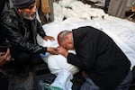 Relatives of the Palestinians who were killed bid farewell in front of the morgue of the Abu Youssef Al-Najjar Hospital after their home east of Rafah was targeted, on Jan. 18.