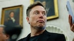 Elon Musk listens during a bilateral meeting between President Trump and South Africa President Cyril Ramaphosa at the White House on May 21, 2025. Musk announced this week that he was leaving the Trump administration and returning to focus on his businesses.