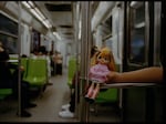 A quiet moment of a young girl’s doll in the women-only section of the metro in November 2023.