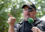 Stewart Rhodes, founder of the Oath Keepers, speaks during a rally outside the White House in 2017.