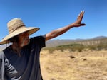 In western Arizona, Ivan Bender, a Hualapai tribal member, points to an area, bordering Hualapai land, where an Australian mining company is exploring for lithium - a key metal in electric vehicle batteries.