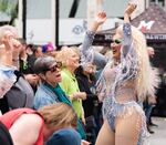 Drag artist BinKyee Bellflower performs with the cast of the Darcelle XV Showplace at the grand opening of the Darcelle XV Plaza in Portland, Ore., June 25, 2026.