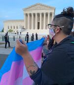 D. Ojeda protesting near the Supreme Court in response to the leaked draft opinion.