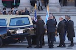 The casket with the Rev. Jesse Jackson arrives before a public visitation at Rainbow/PUSH Coalition in Chicago on Thursday.
