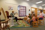 A volunteer at the Sutherlin Public Library hosts story time.