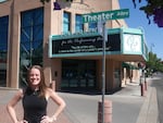 TMTO program director Cailey McCandless stands in front of the program’s home venue, the Craterian Theater, in the heart of downtown Medford.