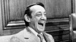 San Francisco supervisor Harvey Milk sits in the mayor's office during the signing of the city's gay rights bill in San Francisco