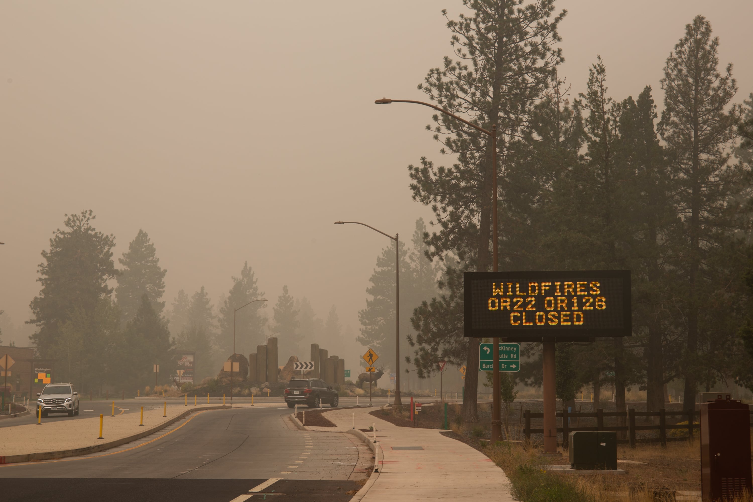 A road sign marks the closure of Highways 22 and 126 on Sept. 12, 2020, near Sisters, Ore.