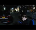 In bodycam footage released by the Milwaukie Police Department, Descamps is seen in the hospital parking lot, unresponsive to surrounding officers.