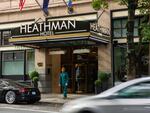 A bellhop at the Heathman Hotel walks out to greet a customer on Tuesday, Oct. 15, 2019, in downtown Portland, Ore. The Heathman is part of Gordon Sondland's Provenance Hotels chain.