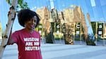 La Tanya Autry, a curatorial fellow at The Museum of Contemporary Art Cleveland, poses outside of the museum in Cleveland on Thursday, Oct. 8, 2020. Museums are being called on to examine what's on their walls amid a national reckoning on racism. Among 18 major U.S. museums, 85% of artists featured are white, while 87% are men, according to a 2019 study conducted at Williams College. Autry helped start an initiative called Museums Are Not Neutral.