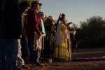 Lillian Begay and singers welcome the sunrise during her Apache Sunrise Dance.