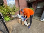 Ridwell driver Jason Glass drives around Southeast Portland collecting items from Ridwell customers on April 15, 2024. He uses a company app that creates his daily route to each customer. On average he makes 100 stops.
