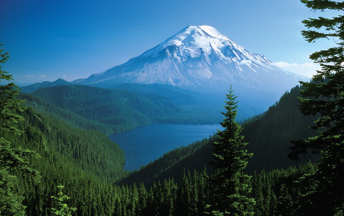 Before it erupted in 1980, Mount St. Helens with Spirit Lake at its base was renowned for its scenic beauty. Its nearly symmetrical snow-capped peak gave it the nickname 