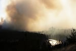 Old Trails Fire is seen from W. Northwest Blvd., Saturday, Aug. 1, 2026, in Spokane, Wash.