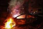 A car burns after a Russian airstrike on a residential neighborhood in Zaporizhzhia, Ukraine, on Saturday.