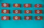 Bricks made by SUS for Bend Pride celebration adorn the wall inside Turtle Island Coffee Shop in Bend, Ore., on Jun. 7, 2024. "Brickie" was the mascot of Bend Pride 2024, a cartoon brick designed by Vernotico for the event.