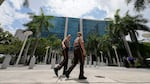 Miami-Dade Sheriff deputies walk in front of the Wilkie D. Ferguson Jr. federal courthouse building in Miami on Friday.