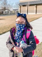 Gigi, 8, outside of school after limited in-person instruction in the Umatilla School District.