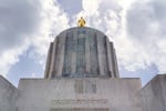 Oregon State Capitol building, May 18, 2021. Oregon's unique tax law sends money back to taxpayers whenever personal income tax revenues come in at least 2% above initial projections during a two-year budget cycle.