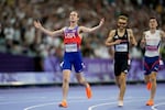 Cole Hocker, of the United States, crosses the finish line ahead of Josh Kerr, of Britain, and fourth placed Jakob Ingebrigtsen, of Norway, to win the men's 1500 meters final at the 2024 Summer Olympics, Tuesday, Aug. 6, 2024, in Saint-Denis, France.