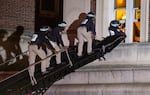 Using a tactical vehicle, New York City police enter an upper floor of Hamilton Hall on the Columbia University campus in New York, Tuesday, April 30, 2024, after the building was taken over by protesters earlier in the day.